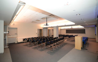 9th Floor Conference Room Suite - Meeting Space in NYC. Two adjoining rooms combined, set up theater style.