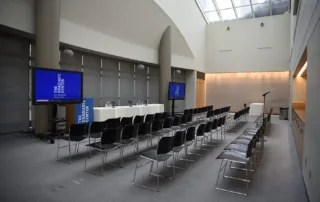 Skylight5-1400-0925 Kelly Skylight Room - Flexible Event Space in NYC. Set up for presentation with screens at the front.