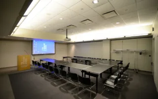 9th Floor Conference Room Suite - Meeting Space in NYC. Room set up for a class or meeting - U-shaped desks.