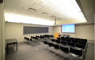 9th Floor Conference Room Suite - Meeting Space in NYC. Room set up for presentation.