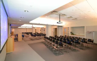 9th Floor Conference Room Suite - Meeting Space in NYC. Three adjoining rooms combined, set up theater style.