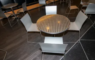 Dining Commons - Reception Space in NYC. Close up of table and chairs during a cocktail hour.