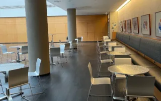 Dining Commons - Reception Space in NYC. Tables and chairs, bench, set up for informal reception.